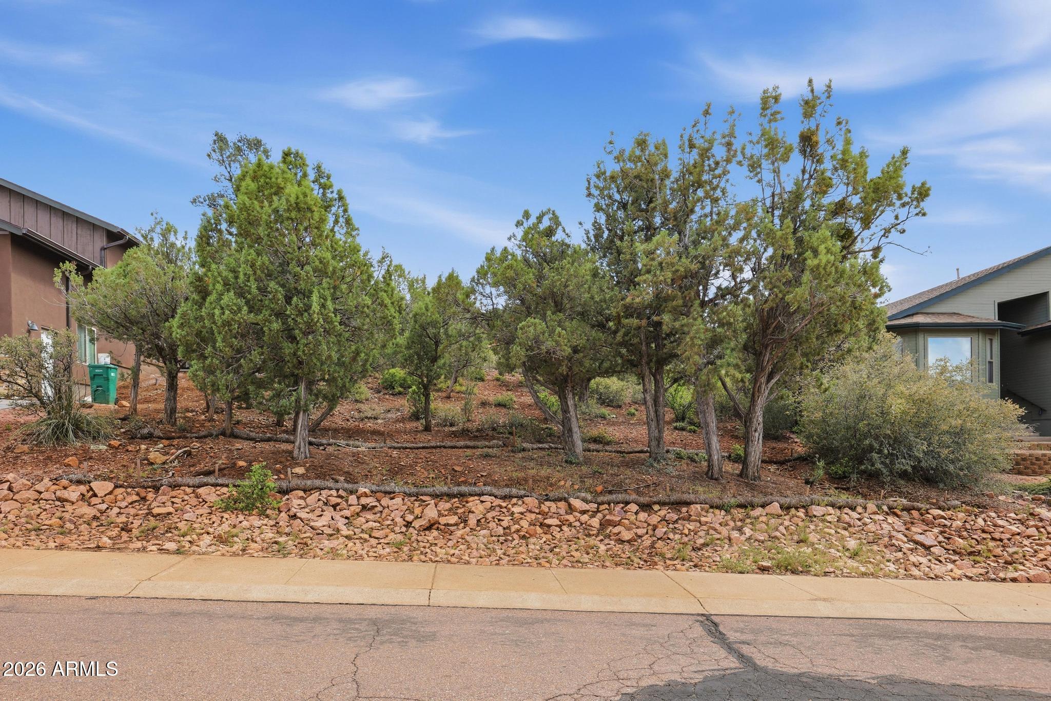 1122 South Sycamore Circle, Unit 58 Payson, AZ 85541 - Photo 5 of 10 a backyard of a house with lots of green space
