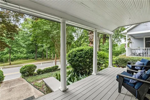 a view of a patio with wooden floor