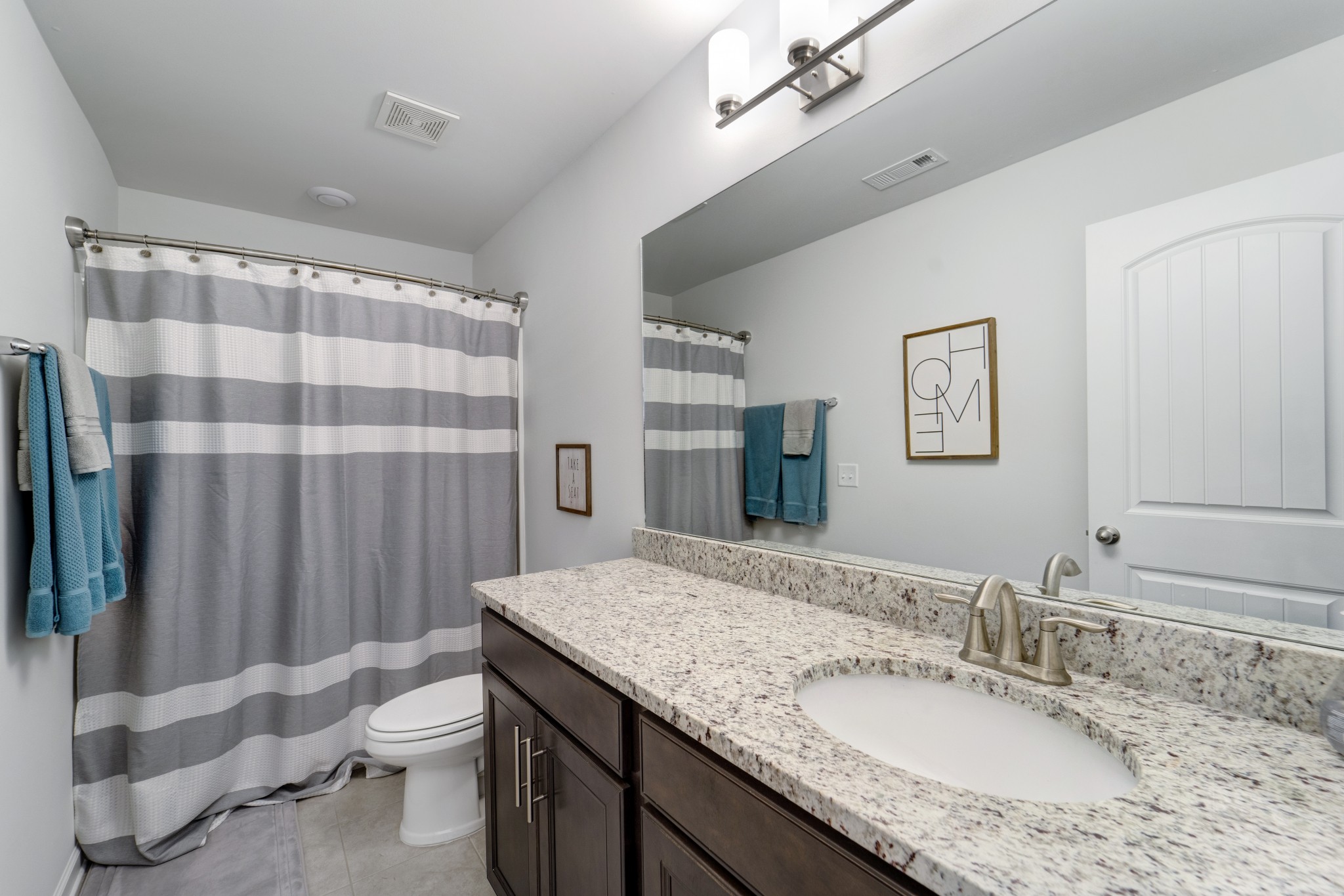 2807 Haversack Circle Murfreesboro, TN 37128 - Photo 17 of 22 a bathroom with a granite countertop sink toilet and shower