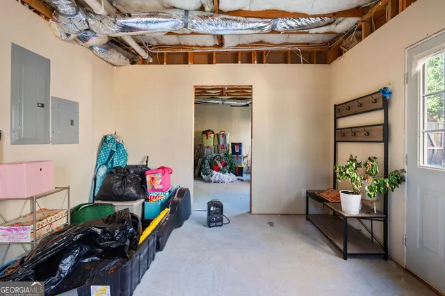 a view of balcony with wooden floor and outdoor seating