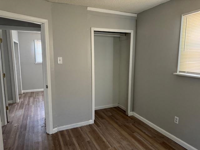 380 Elder Road Memphis, TN 38109 - Photo 7 of 9 an empty room with wooden floor and closet