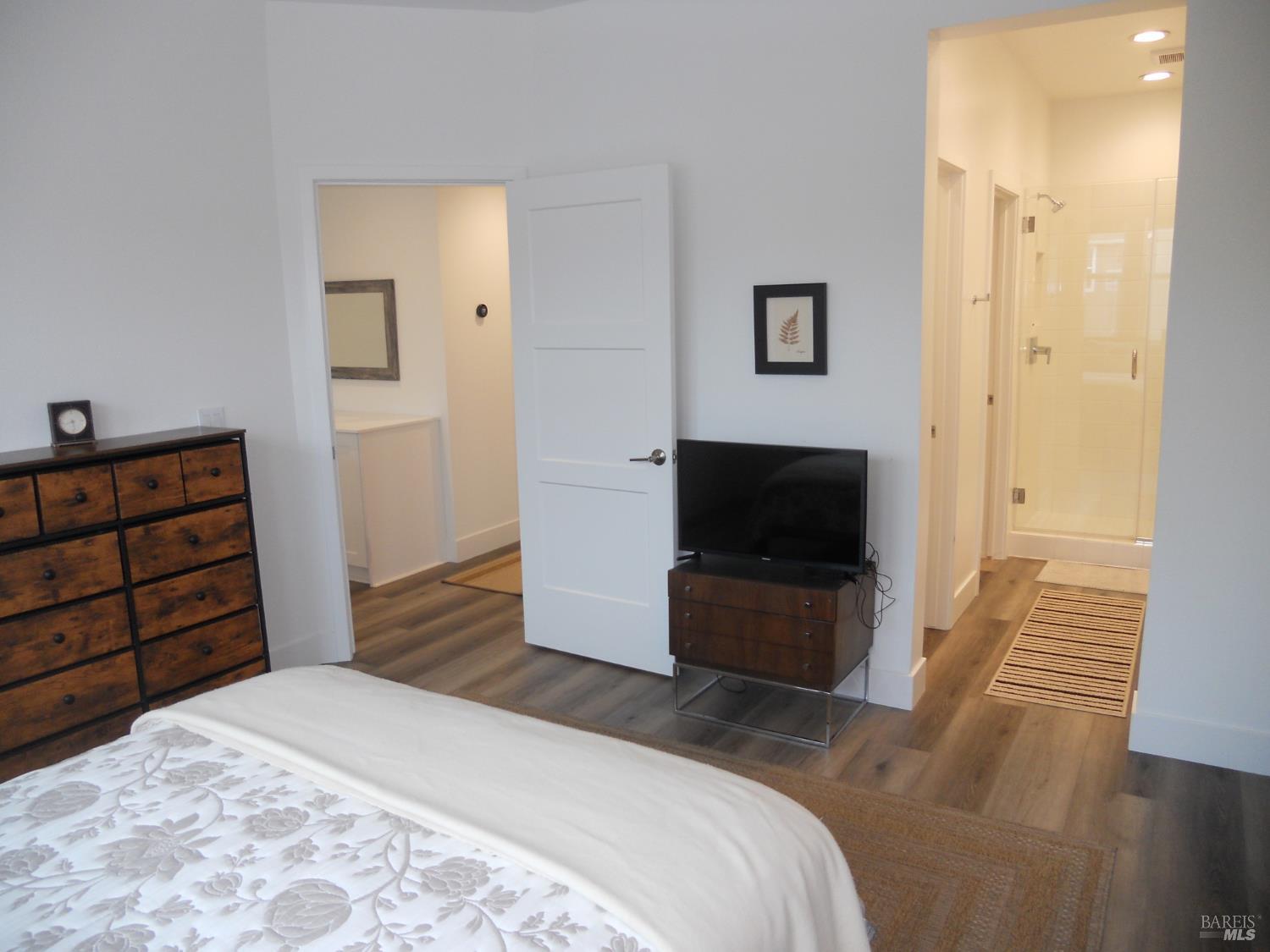 451 Semillon Lane Santa Rosa, CA 95403 - Photo 15 of 23 a bedroom with a bed and a television