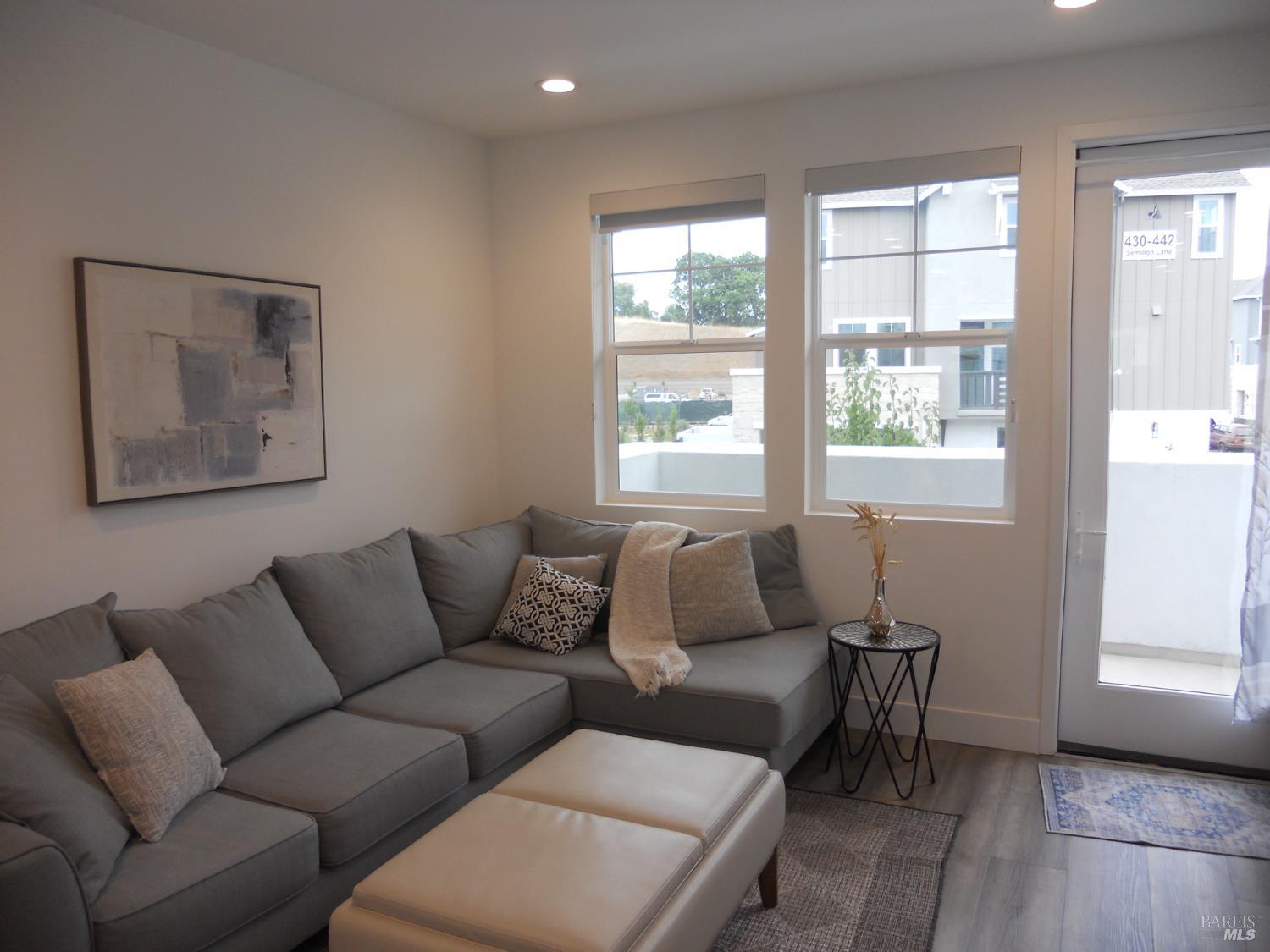 451 Semillon Lane Santa Rosa, CA 95403 - Photo 8 of 23 a living room with furniture and a window