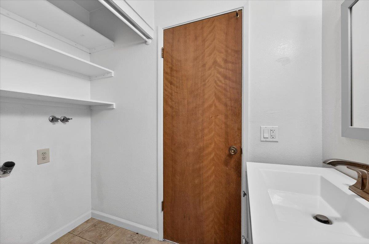 4875 North Backer Avenue, Unit 143 Fresno, CA 93726 - Photo 12 of 27 a bathroom with a tub and shower