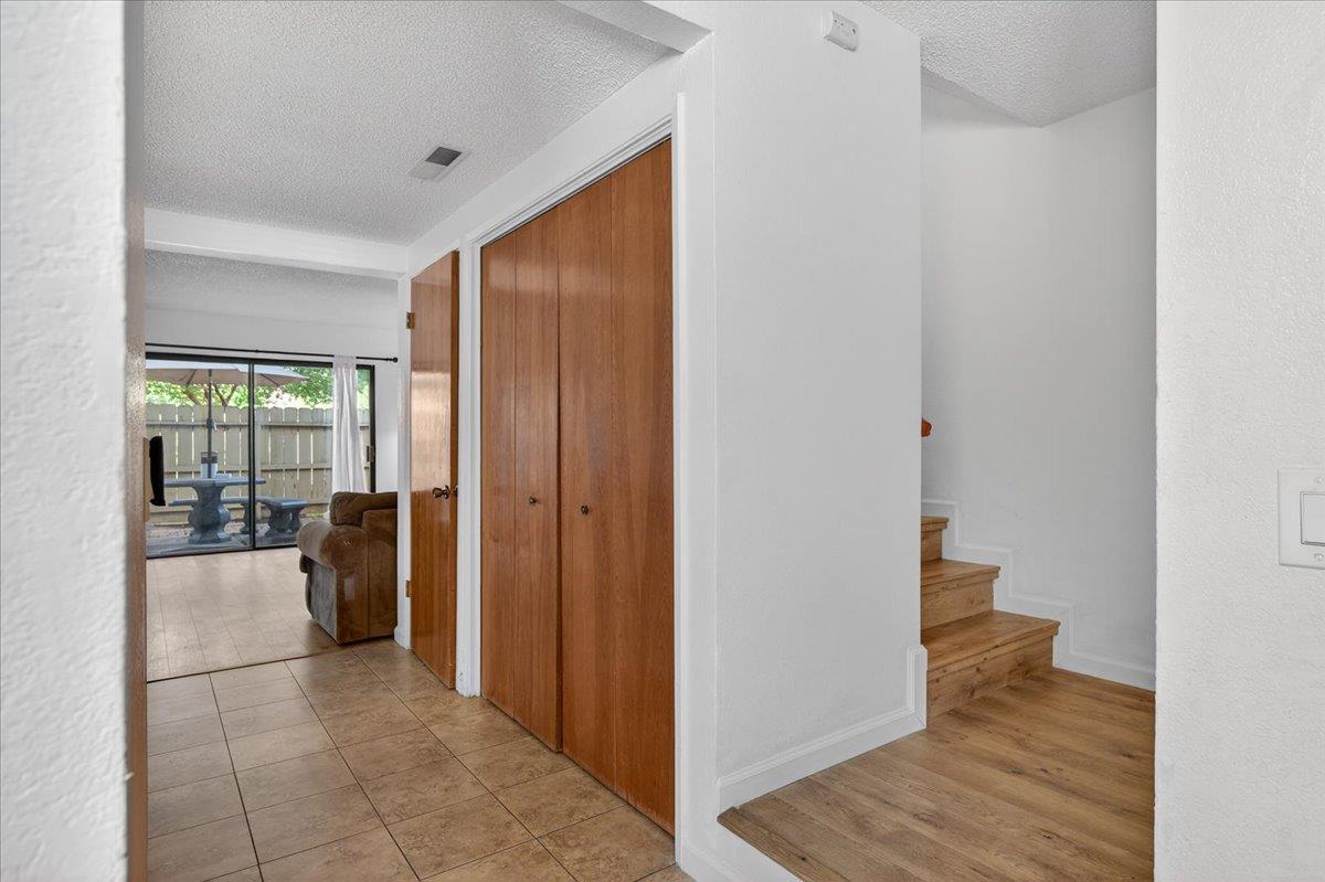 4875 North Backer Avenue, Unit 143 Fresno, CA 93726 - Photo 13 of 27 a view of a hallway and wooden floor