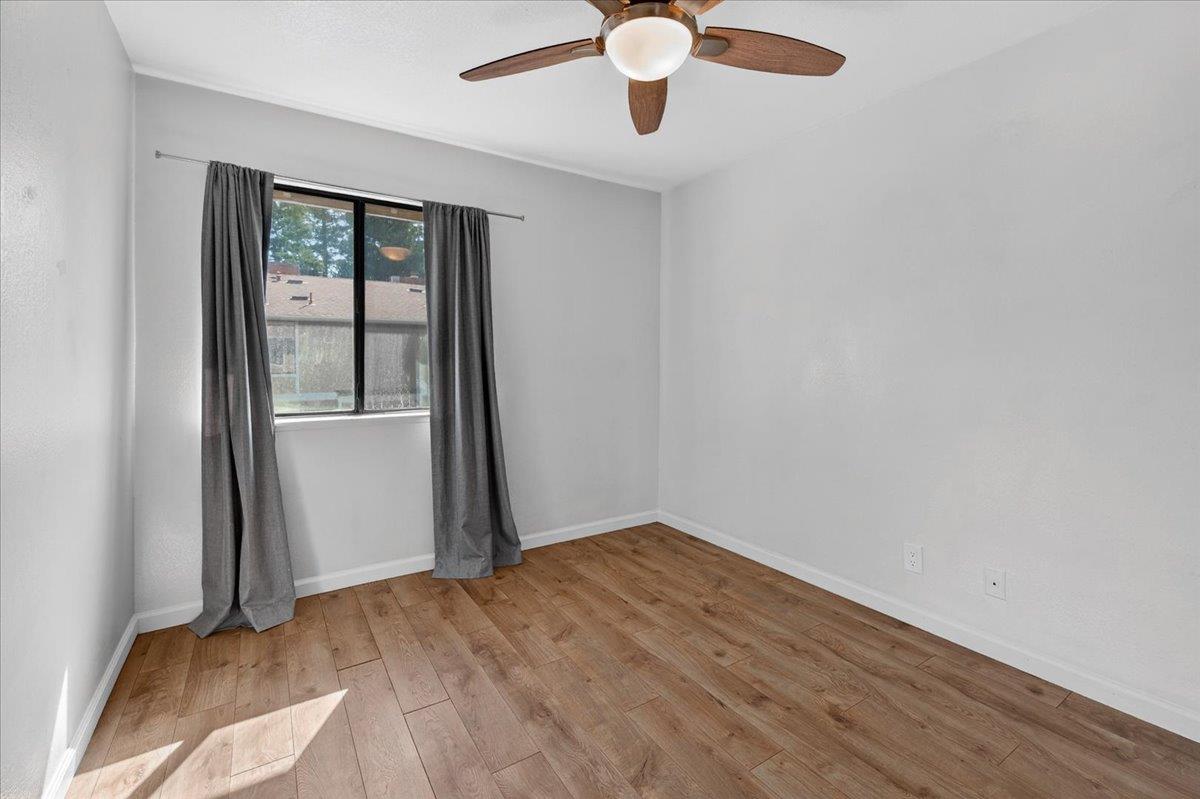4875 North Backer Avenue, Unit 143 Fresno, CA 93726 - Photo 17 of 27 an empty room with a window