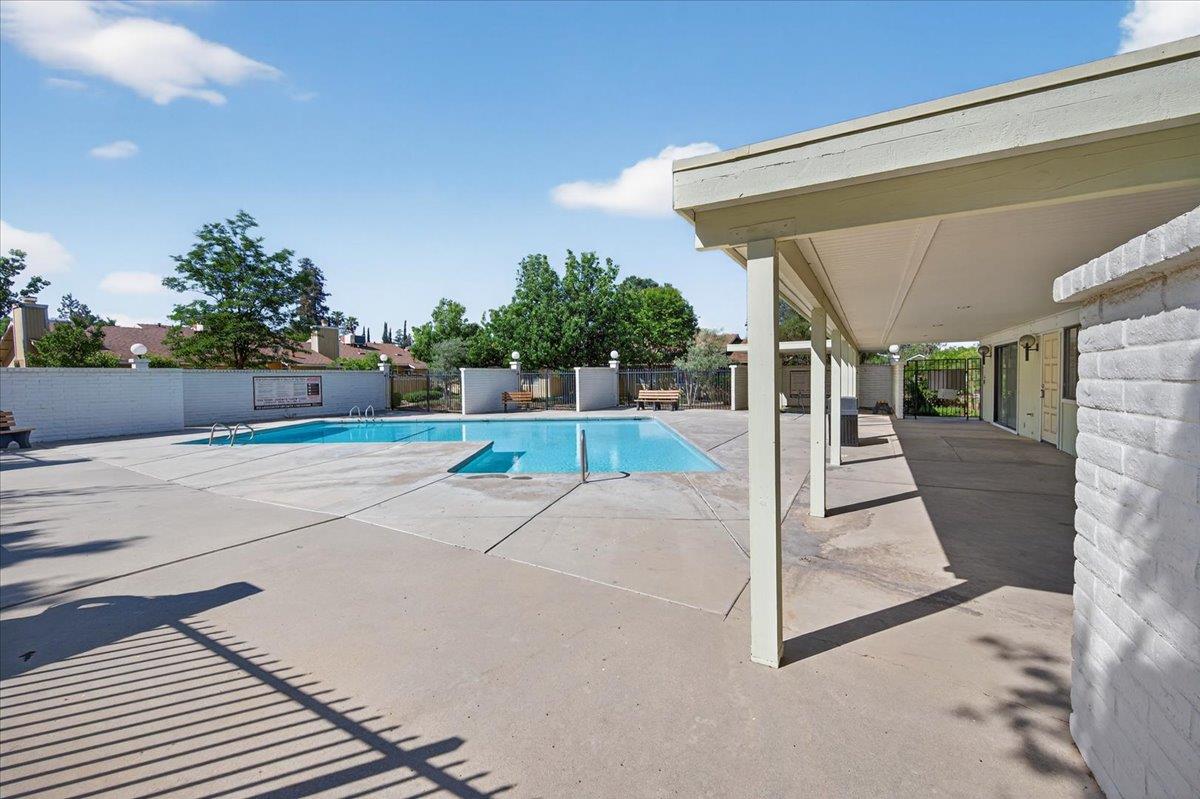 4875 North Backer Avenue, Unit 143 Fresno, CA 93726 - Photo 26 of 27 a view of a backyard