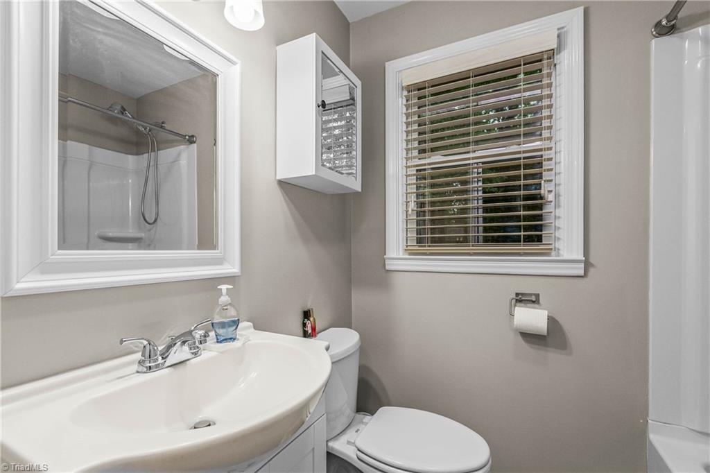 4720 Warner Road Pfafftown, NC 27040 - Photo 13 of 26 Hall bathroom between the 2nd and 3rd bedrooms.