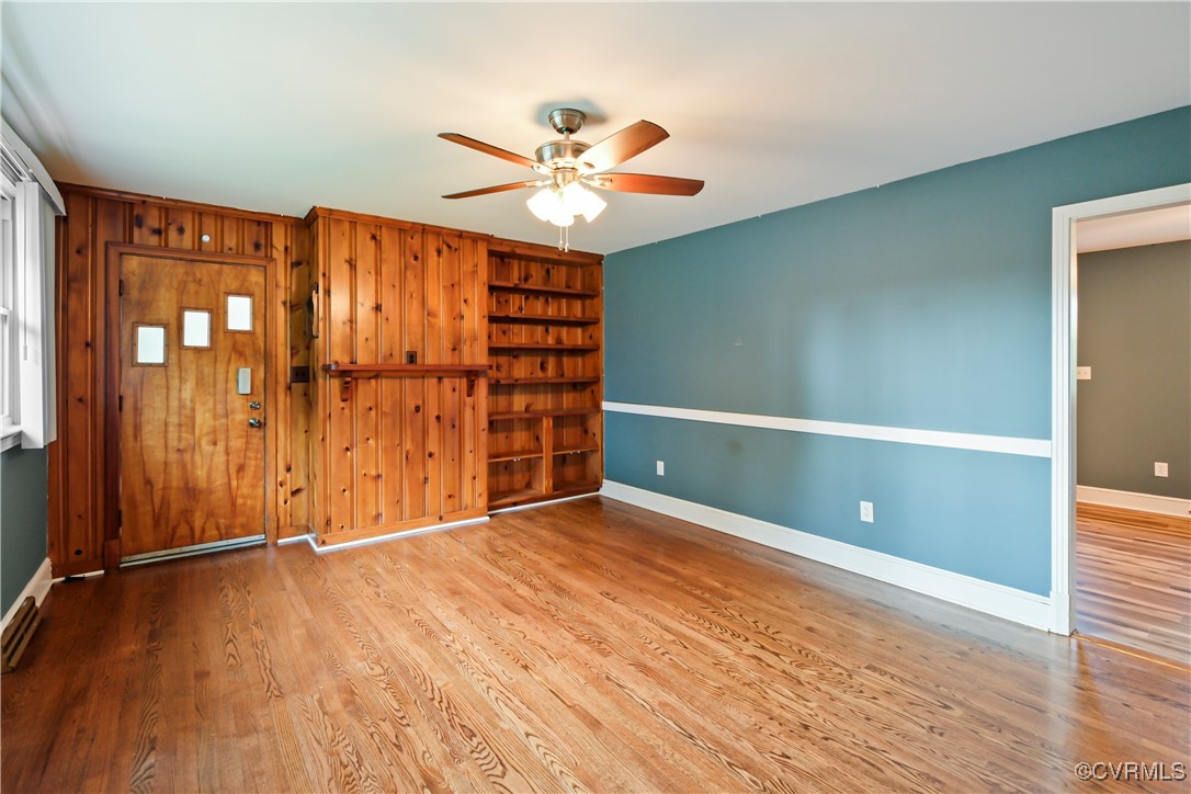 1560 Cumberland Road Farmville, VA 23901 - Photo 1 of 20 wooden floor in an empty room with a window