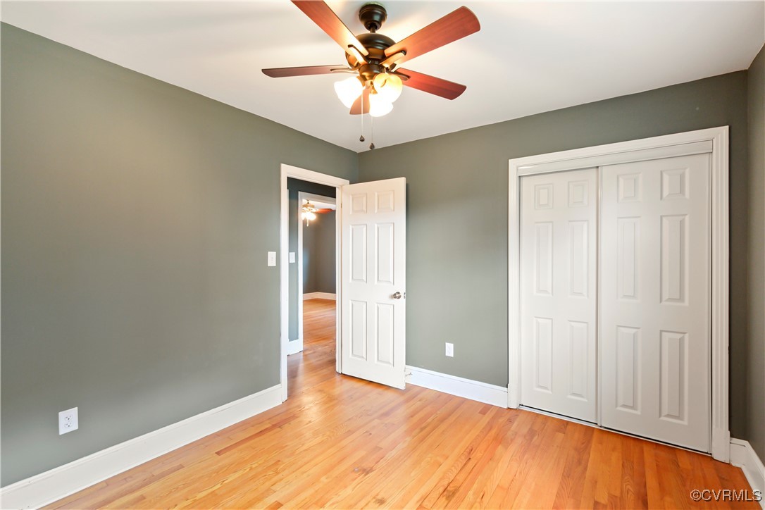 1560 Cumberland Road Farmville, VA 23901 - Photo 11 of 20 wooden floor in an empty room with a window