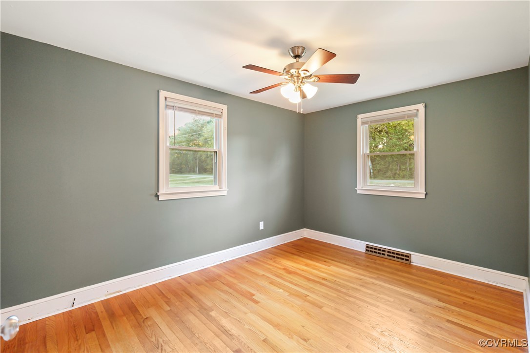 1560 Cumberland Road Farmville, VA 23901 - Photo 12 of 20 a view of a big room with wooden floor and closet