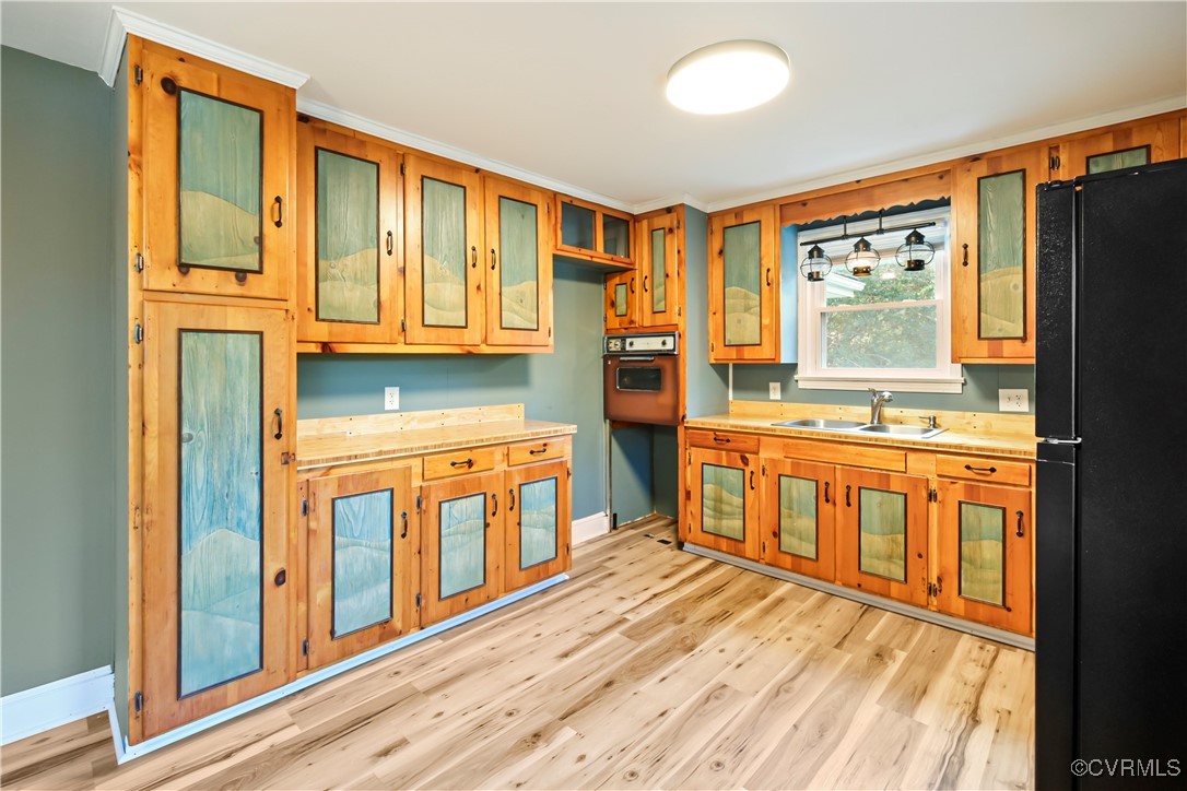 1560 Cumberland Road Farmville, VA 23901 - Photo 6 of 20 a view of a kitchen with stainless steel appliances granite countertop a refrigerator a stove and a sink with wooden floor