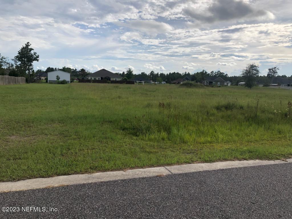 a view of a golf course with a garden