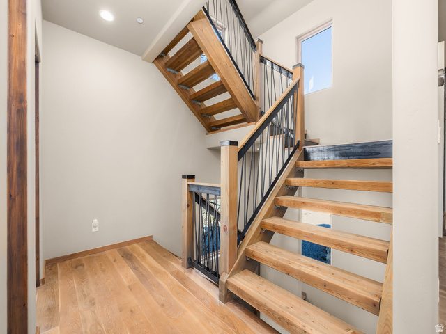 22677 East Snowbird Drive, Unit 47 Helper, UT 84526 - Photo 16 of 43 Stairs featuring wood finished floors and baseboards