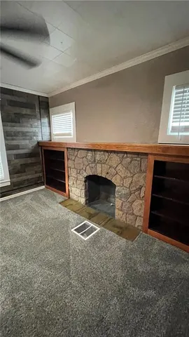 a living room with a fireplace