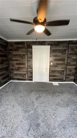 a view of room that has a fireplace