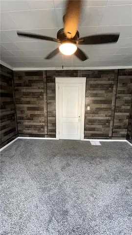 a view of room that has a fireplace