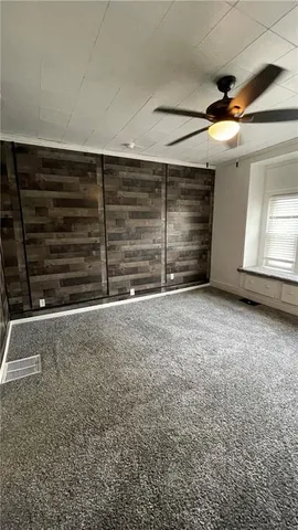 a view of a room with an empty space