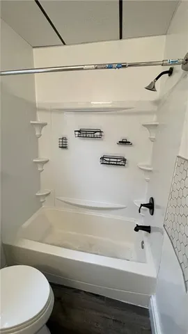 a bathroom with a white tub