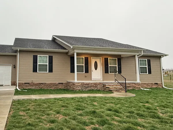 a house view with a garden space