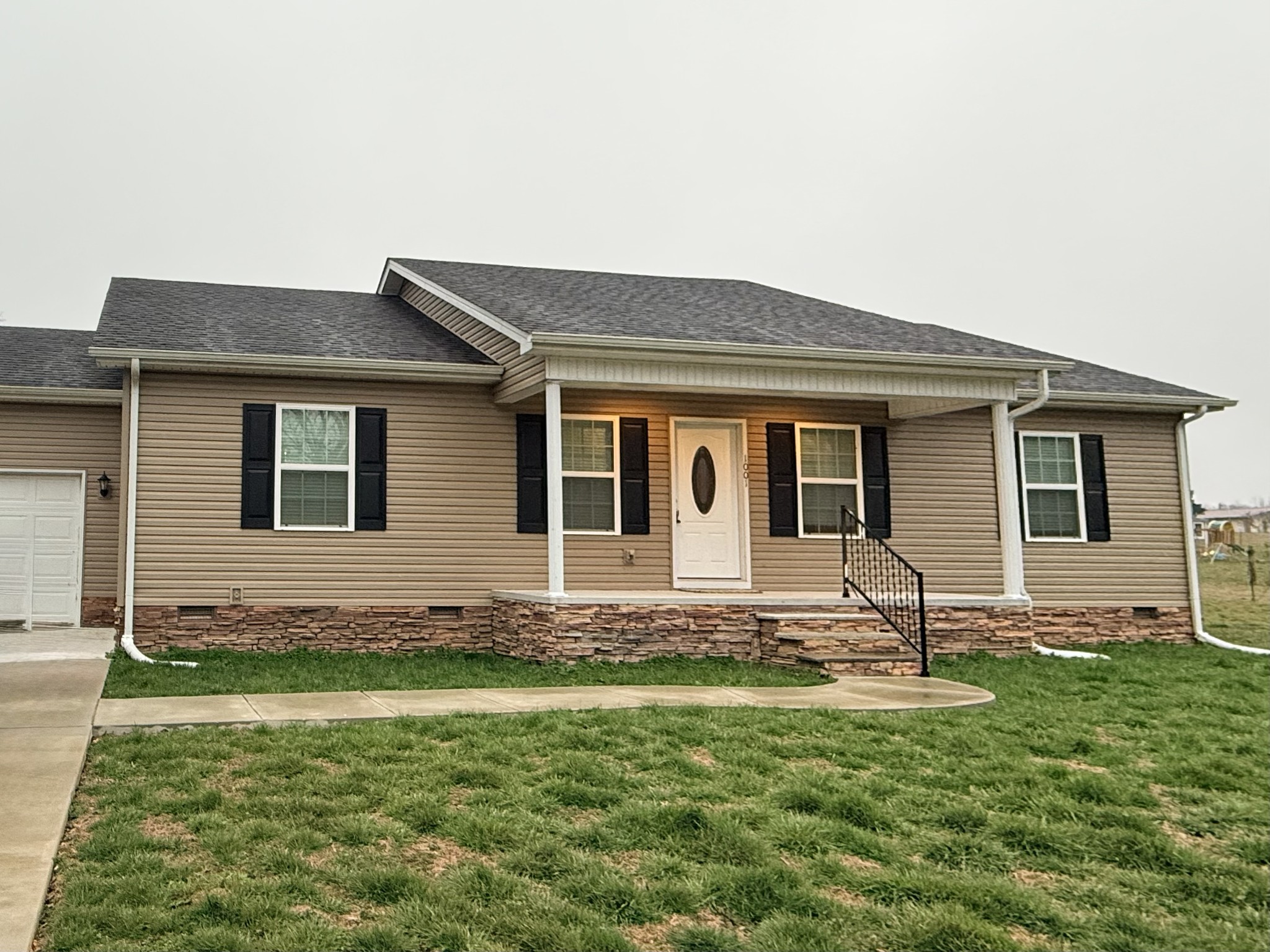 a house view with a garden space