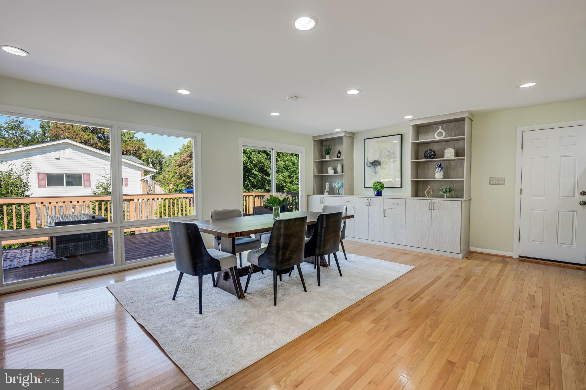 8808 Gateshead Road Alexandria, VA 22309 - Photo 10 of 38 Dining room features built-ins and deck access