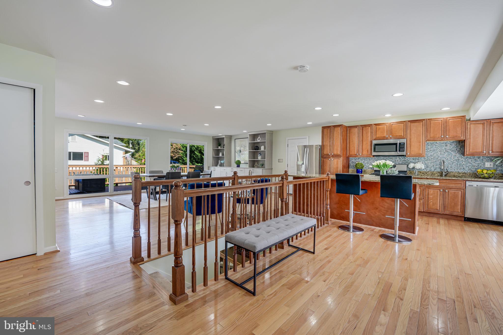 8808 Gateshead Road Alexandria, VA 22309 - Photo 2 of 38 Bar seating at the island in this updated kitchen