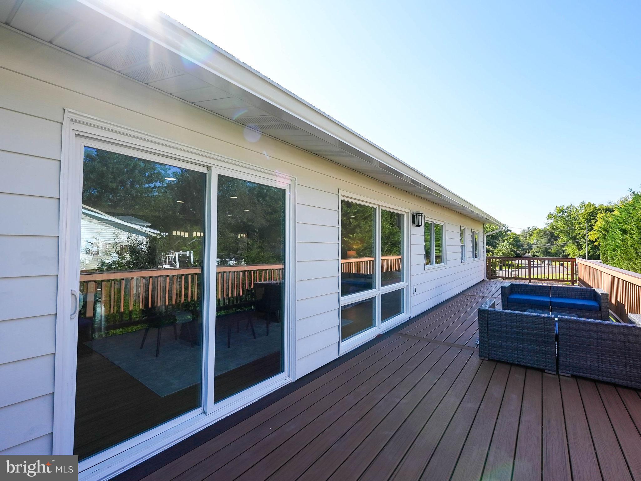 8808 Gateshead Road Alexandria, VA 22309 - Photo 30 of 38 Deck is entire width of the home!