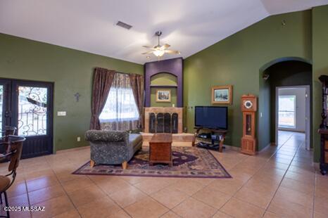 480 Camino Ramanote Rio Rico, AZ 85648 - Photo 10 of 43 Cozy wood burning fireplace corner in great room.