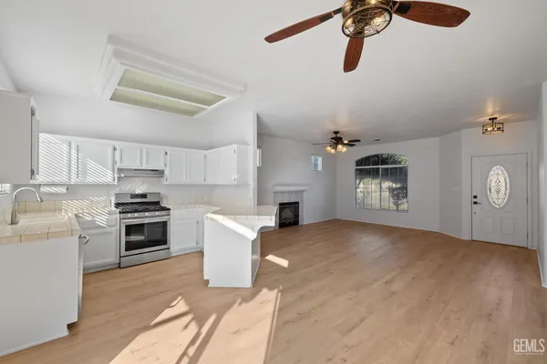 a kitchen with a stove and a sink