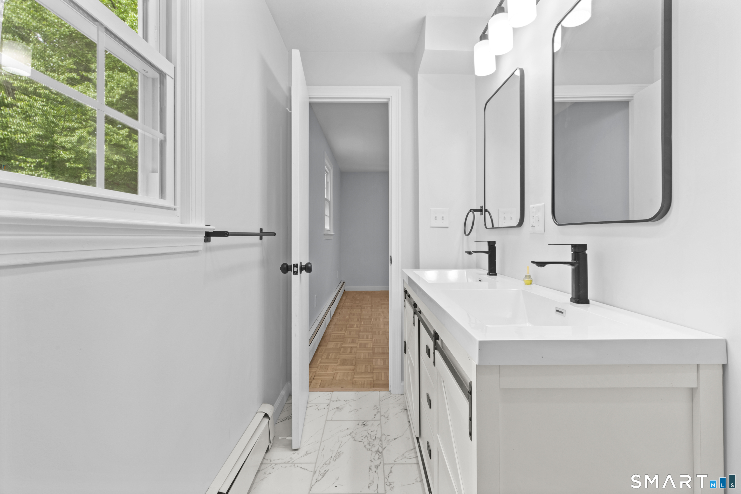 20 Quiet Woods Road East Hampton, CT 06424 - Photo 15 of 40 a bathroom with a sink vanity and a mirror