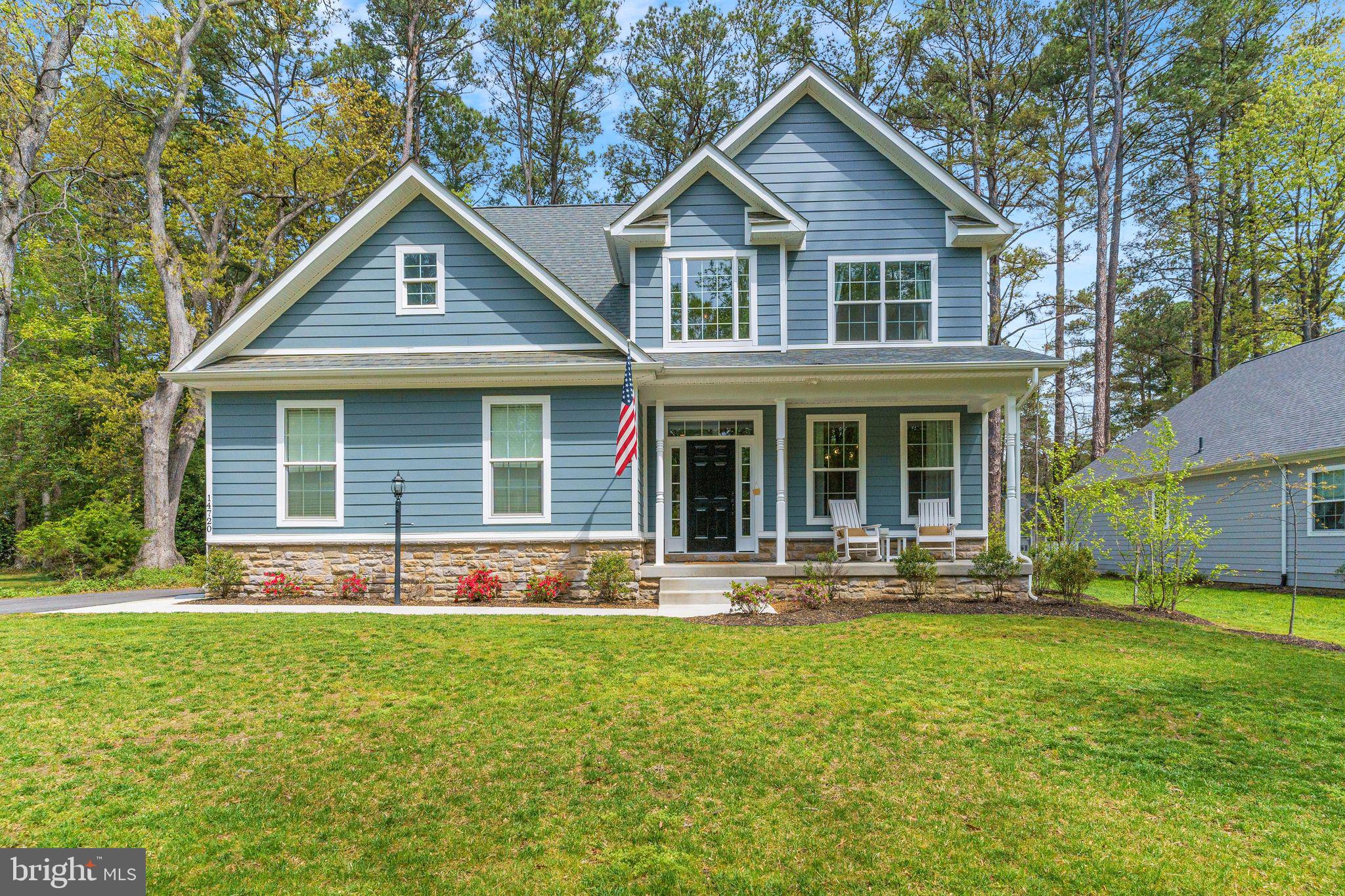 front view of a house with a yard