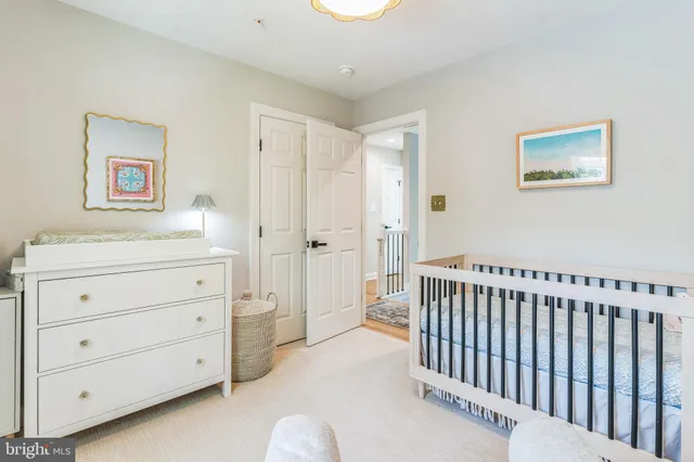 a view of a hallway with closet area