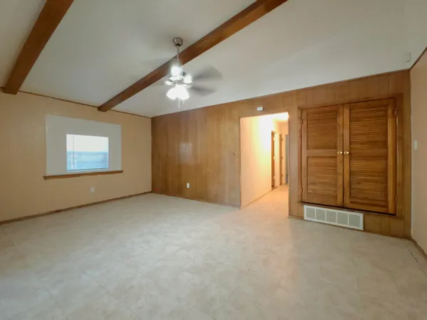 an empty room with windows