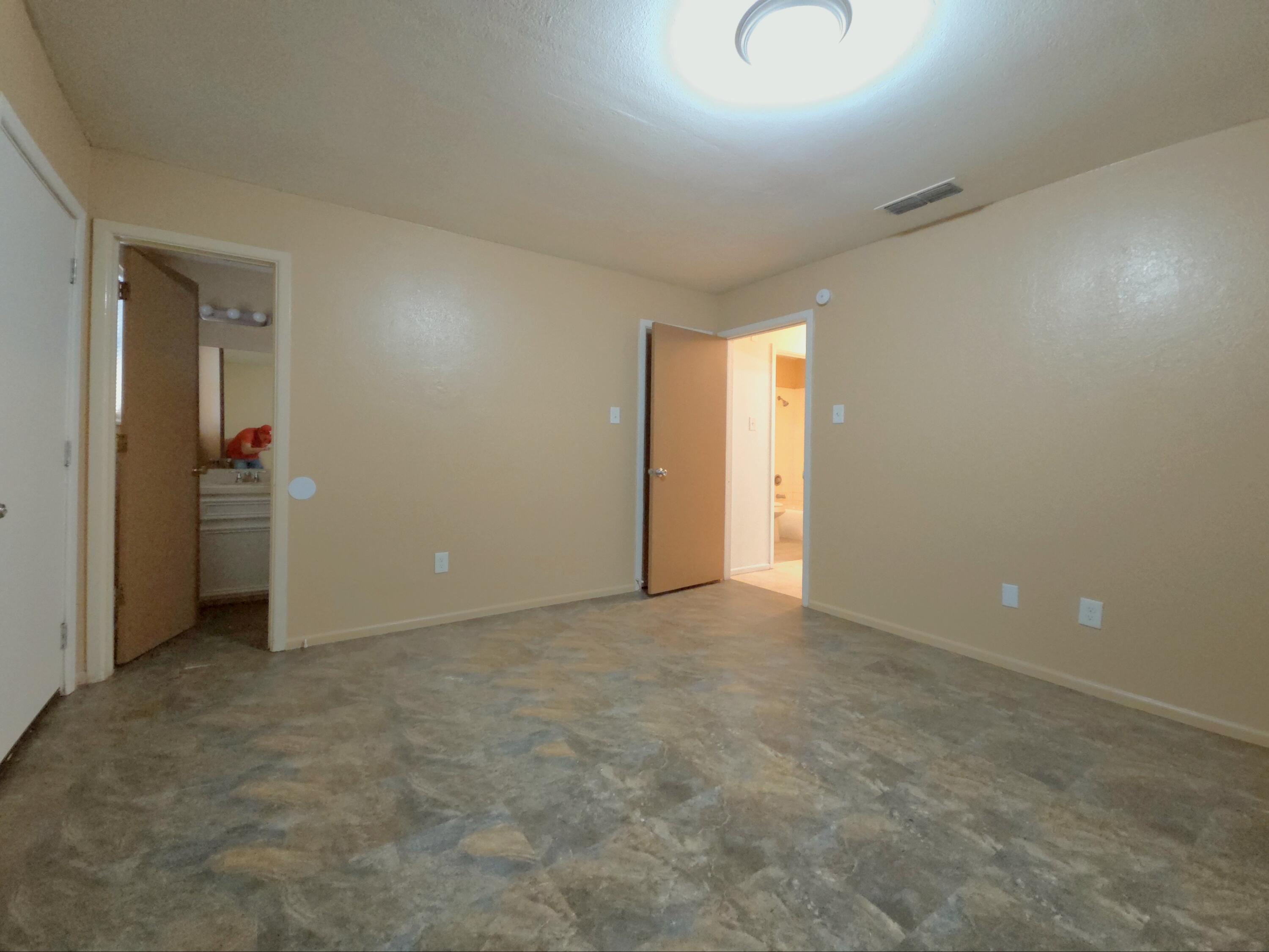 1608 28th Street Lubbock, TX 79411 - Photo 9 of 10 an empty room with closet area