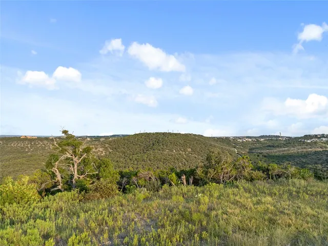 a view of a city with an ocean beach