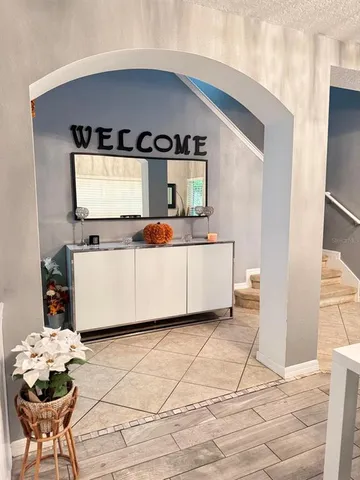 a living room with a couch and a table