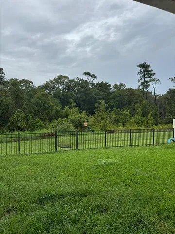 a view of a golf course with a park