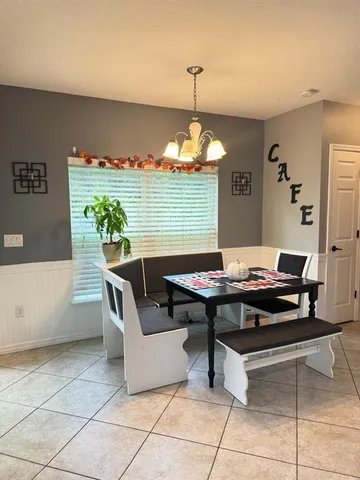 a view of a dining room and a table in a living room