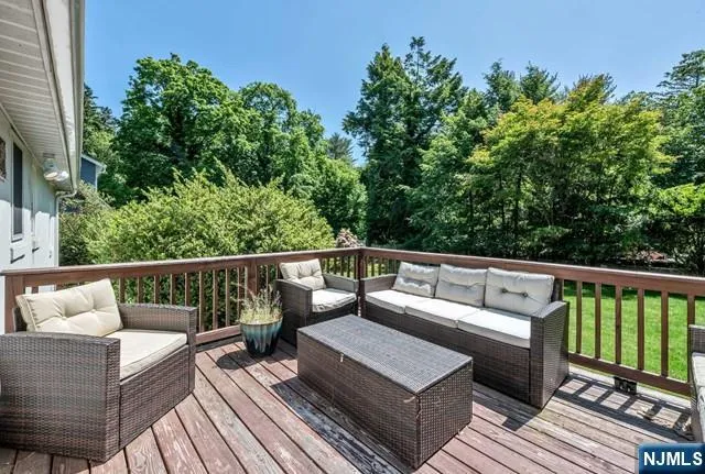a view of roof deck with patio