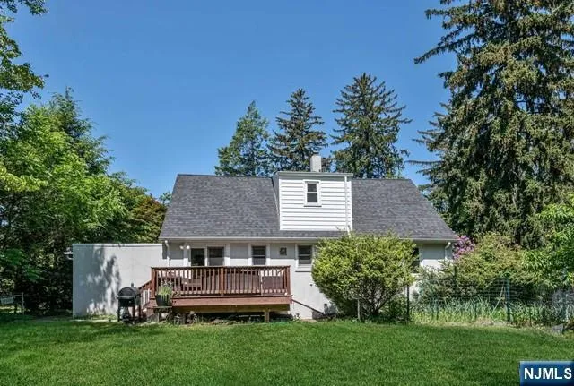 front view of a house with a garden