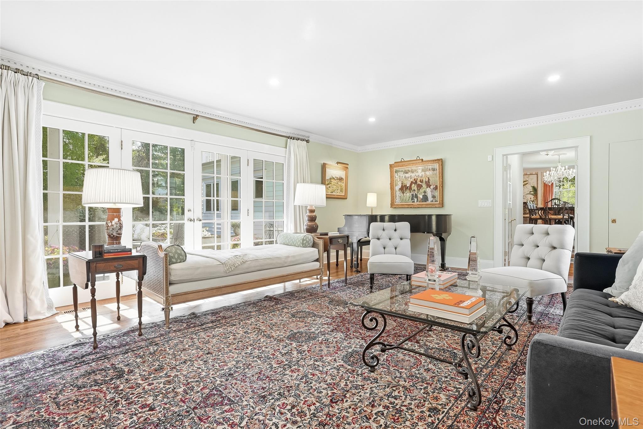 164 Julian Street Rye, NY 10580 - Photo 13 of 38 a living room with furniture and a floor to ceiling window