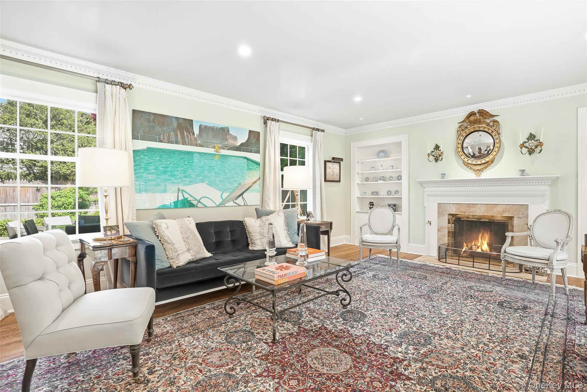 164 Julian Street Rye, NY 10580 - Photo 14 of 38 a living room with furniture a large window and a fireplace