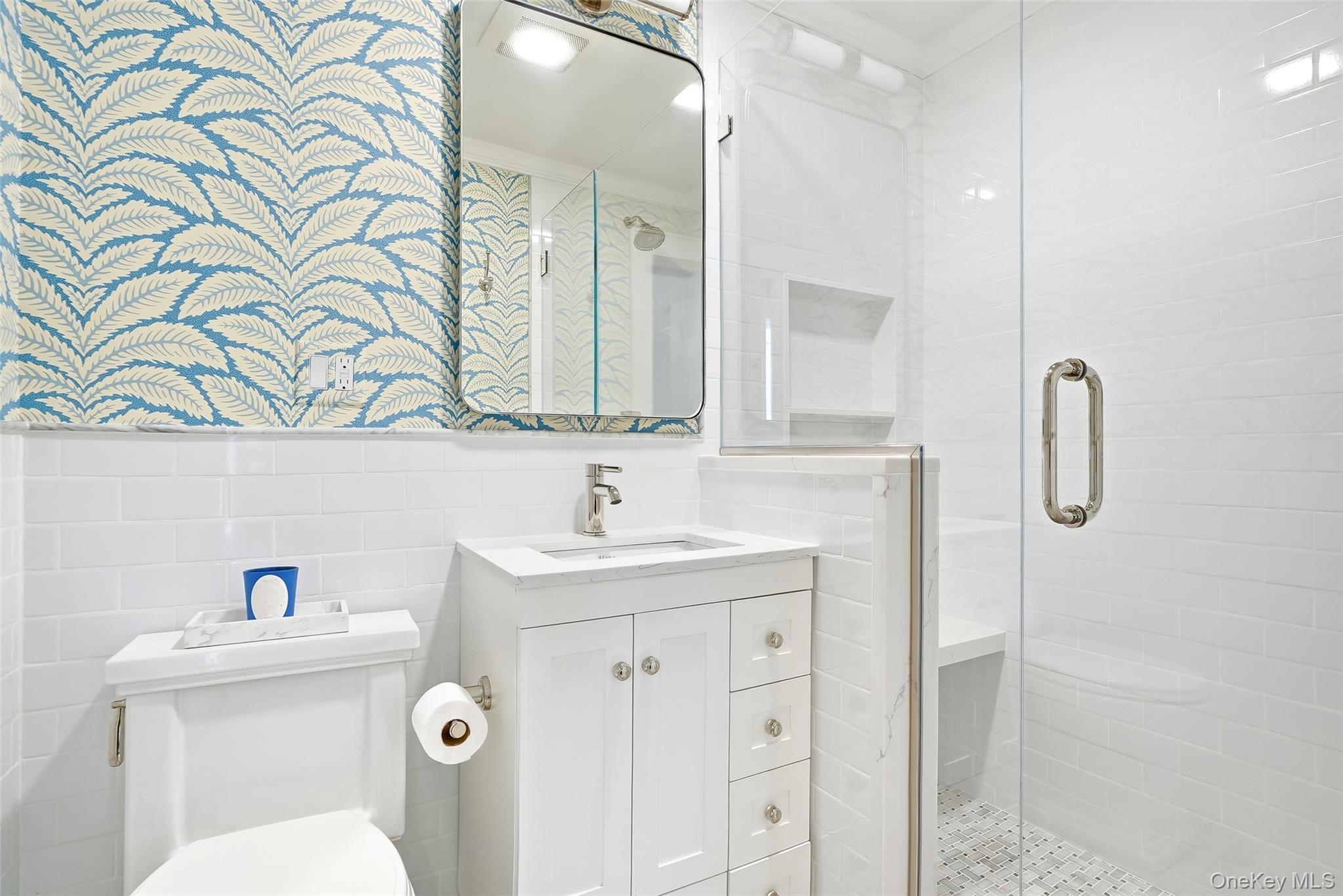 164 Julian Street Rye, NY 10580 - Photo 27 of 38 a bathroom with a sink a toilet and a mirror
