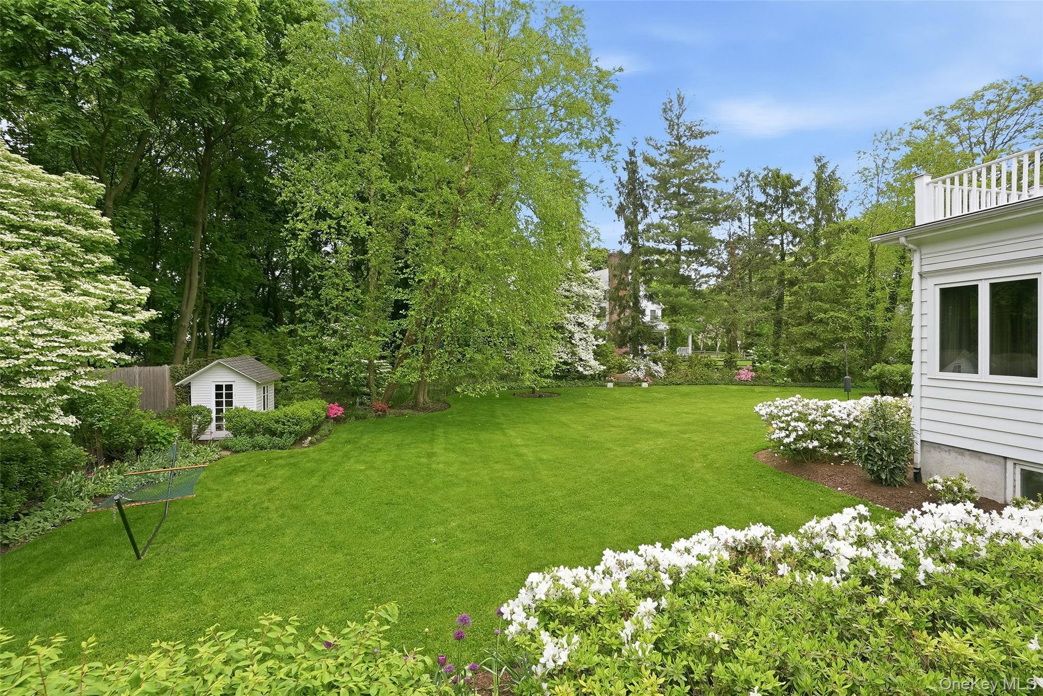 164 Julian Street Rye, NY 10580 - Photo 37 of 38 a view of a house with a yard