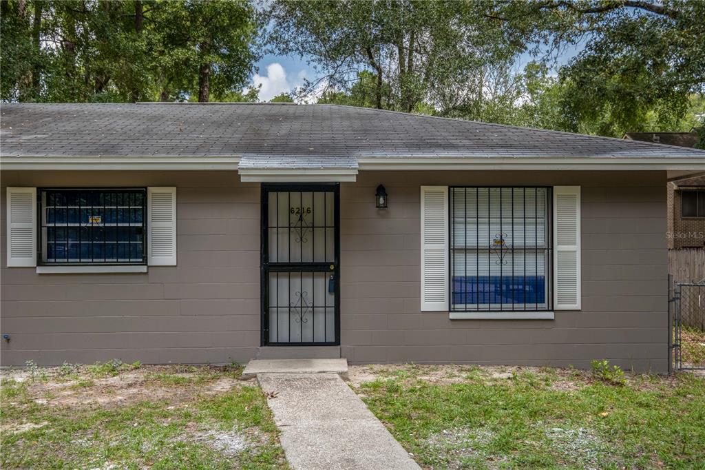 6216 Southwest 10th Place, Unit A Gainesville, FL 32607 - Photo 1 of 1 a backyard of a house