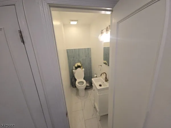 a bathroom with a mirror