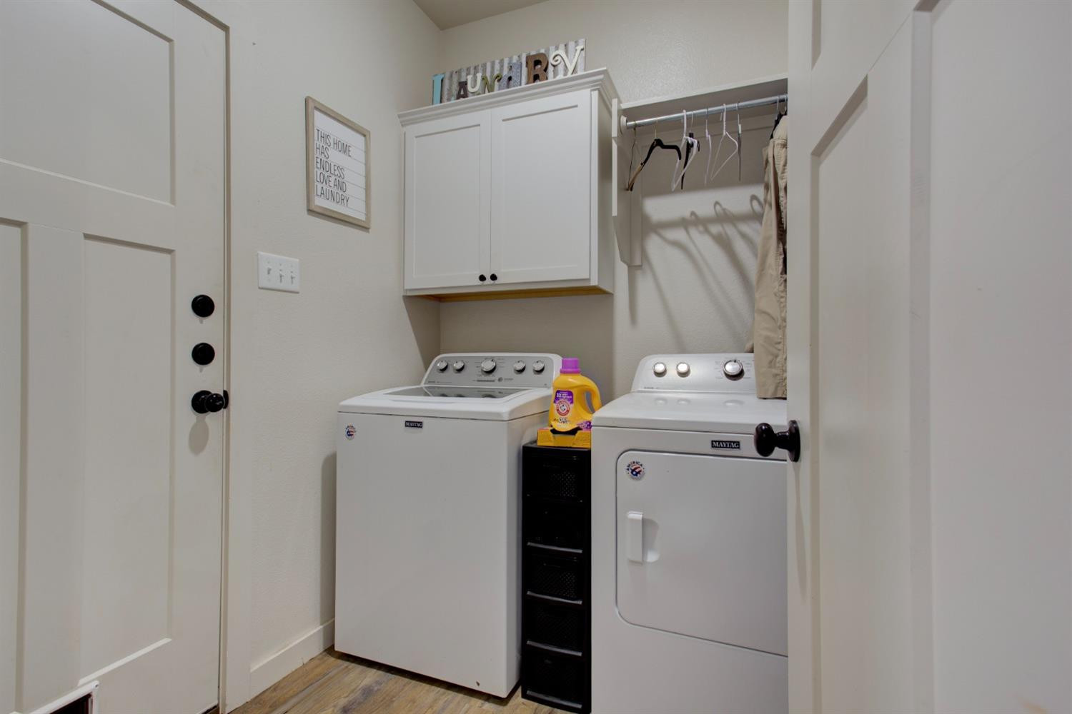 2721 137th Street Lubbock, TX 79423 - Photo 22 of 30 a utility room with dryer and washer