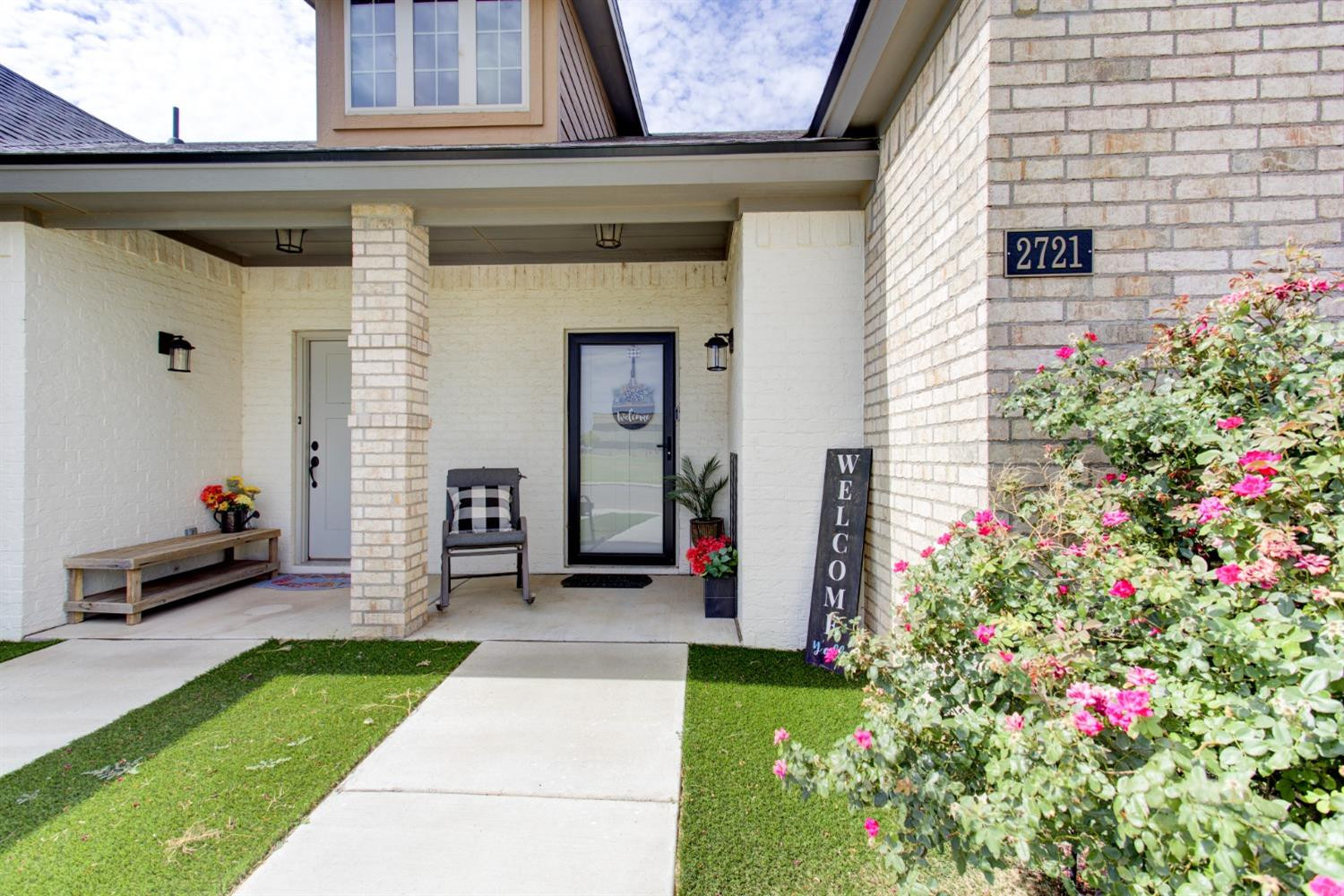 2721 137th Street Lubbock, TX 79423 - Photo 10 of 30 a front view of a house with a porch