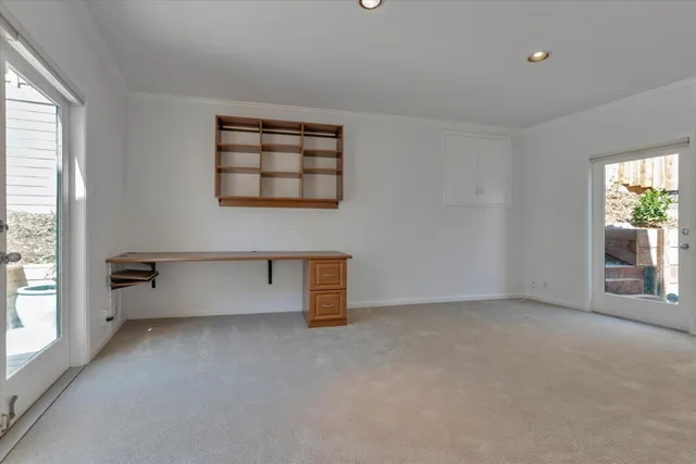 an empty room with windows